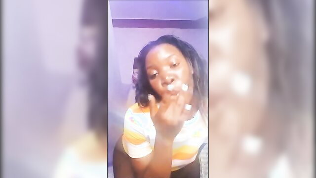 Samantha Johnson ebony beauty blowing kiss in striped top