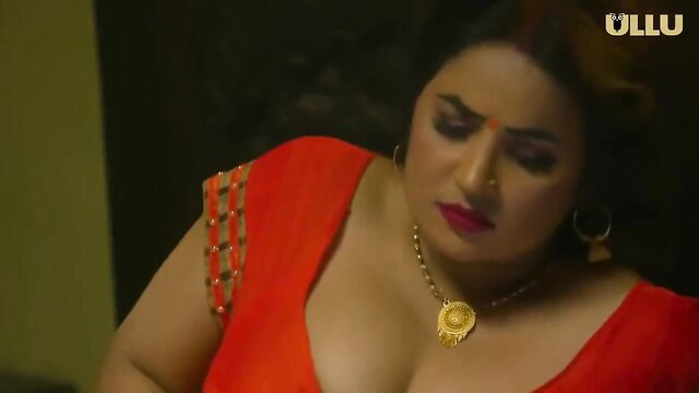 Curvy Indian MILF in deep red cleavage dress, Ullu Malai hot series
