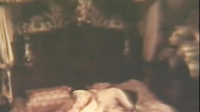 Vintage Euro babe nude on bed in classic historic erotica