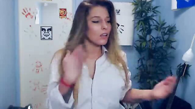 Blonde camgirl in open white shirt dances teasingly on cam