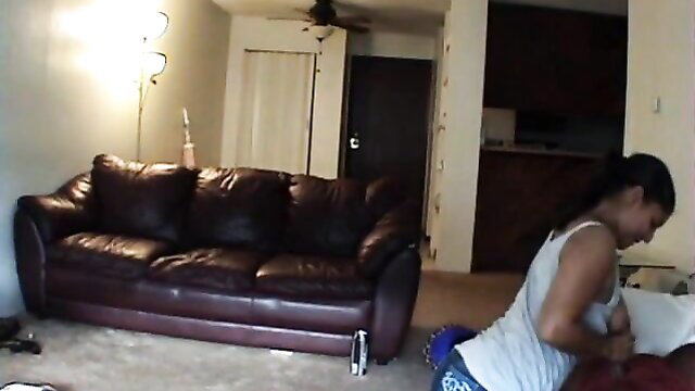 Cheating Asian teen slut caught kneeling on floor exposing tits