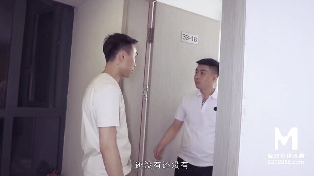 Two young Asian men talking outside room 39-18 in Chinese cuckold video