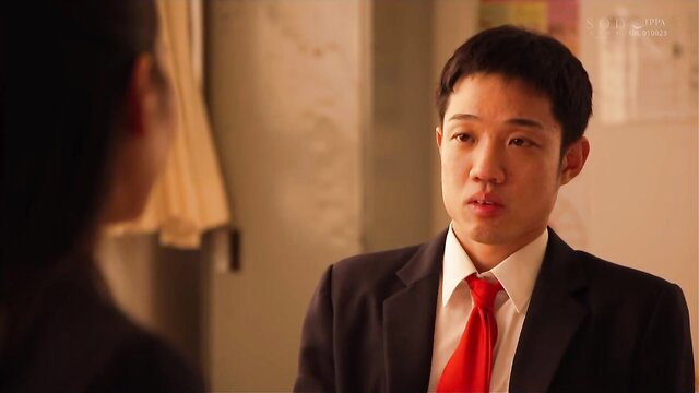 Suzu Honjo as a teacher looking at a student