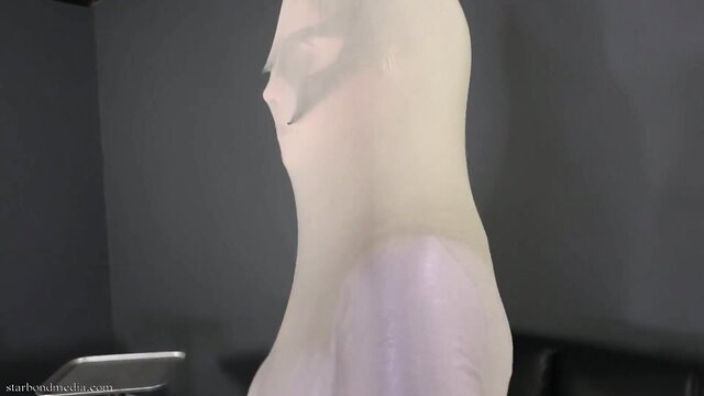 Chrissy Marie in tight white latex catsuit and hood, Batgirl Catwoman ploy