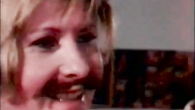 Blonde MILF laughing in classic 80s VHS porn thumbnail