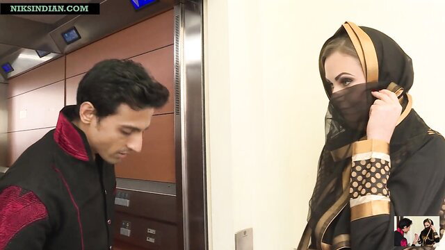 Tina Kay in hijab with Indian man in airport elevator tease