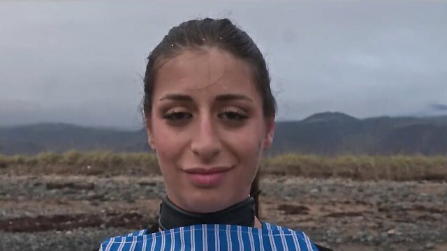 Silvia Soprano submissive Italian beauty collared on Norway beach