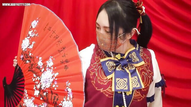 Abby Kitty in bitch sissy cosplay with fan, edging training tease