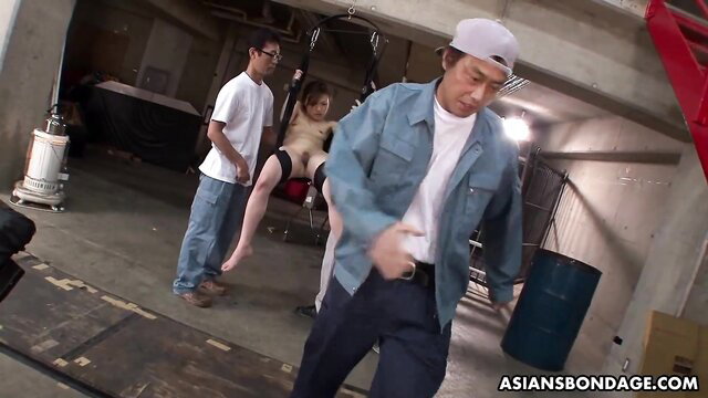Aiko Hirose bound and suspended in Asian bondage scene