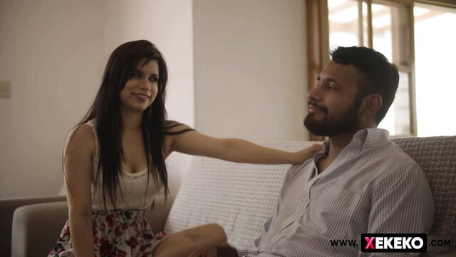 Indian beauty in skirt seduces guy on couch, steamy tease