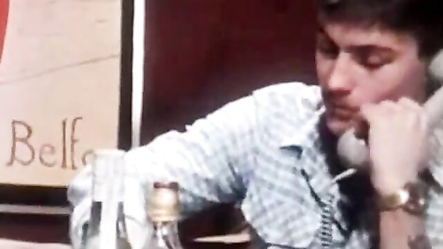 Hot guy on retro phone call in steamy 80s porn scene