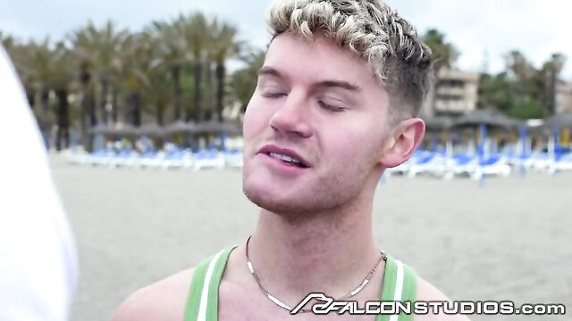 Giga Chad Latino hunk with blonde hair on beach, Falcon Studios