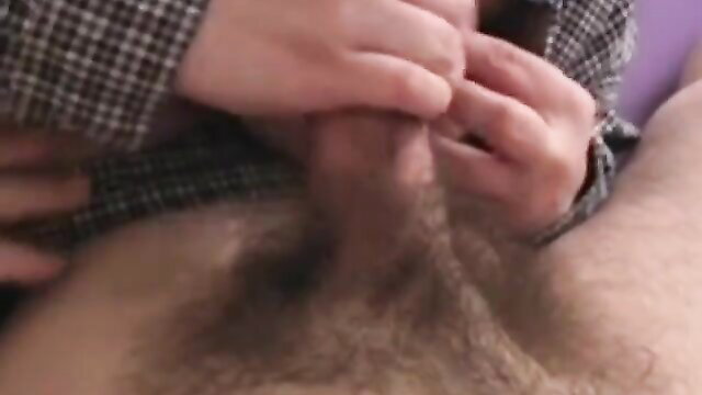 BBW giving handjob to man in bedroom closeup