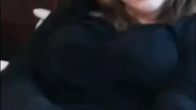 Big boob amateur teen with long dark hair smiling on webcam