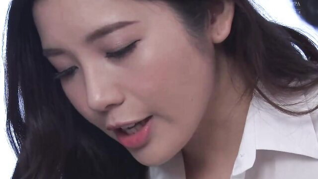 Asian JAV babe in white blouse closeup, sexy lips and eyes