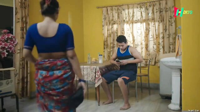 Indian MILF in saree and blouse teases guy on chair in Matki Ullu serial