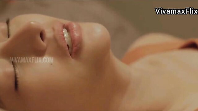 Asian beauty in orange lingerie lying seductively, Walker 2025 sex scene