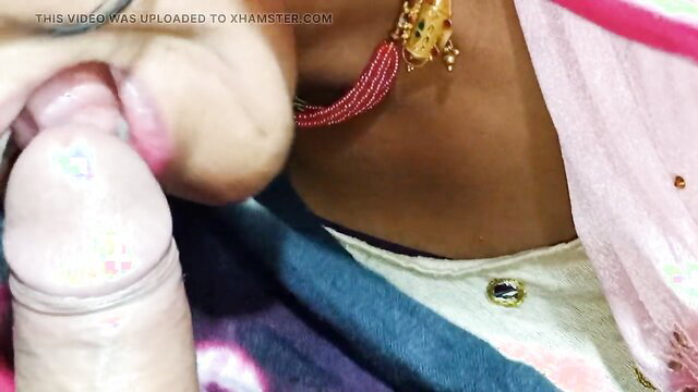 Indian woman in saree sucking thick black cock closeup