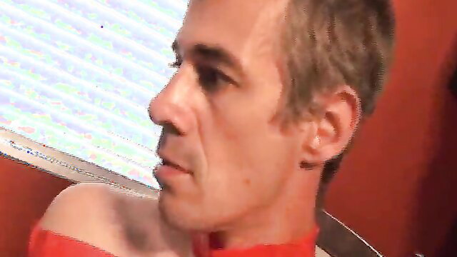 Sandra Romain closeup profile in red top at wild wedding orgy