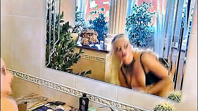 Blonde bombshell in black lingerie posing seductively in mirror, Mistress without mercy Ep 2