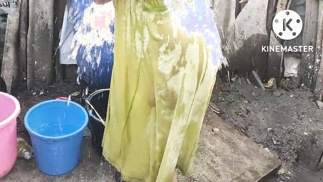Hot Indian Bhabhi Anita Yadav wet see-through sari bathing