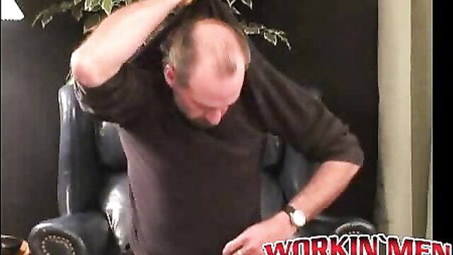 Bald mature carpenter Bryant shirtless in chair, WorkinMen XXX
