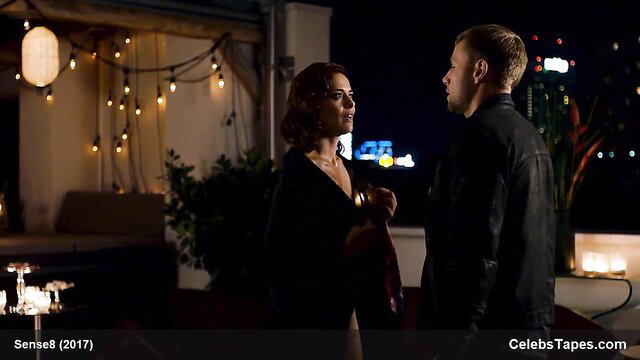 Valeria Bilello sexy clothed tease on balcony with man