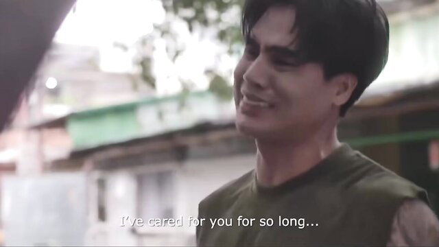 Handsome Asian man in tank top smiles emotionally in Tahong VIVAmaX scene