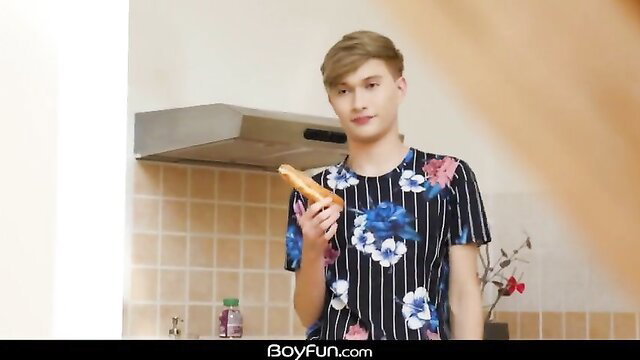 Finn Harper holds banana in floral shirt, BoyFun twink tease