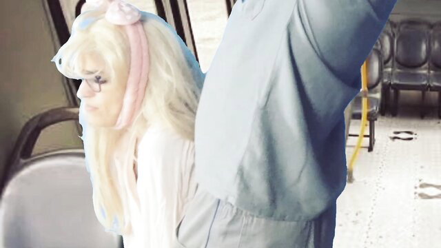 Blonde bombshell in pink bow pushed by worker on public bus