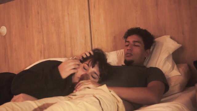 Latino stepbros cuddling intimately in bed, throat play tease