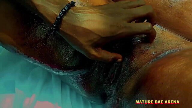 Black mature woman fingered by man, wet pussy spread in explicit closeup