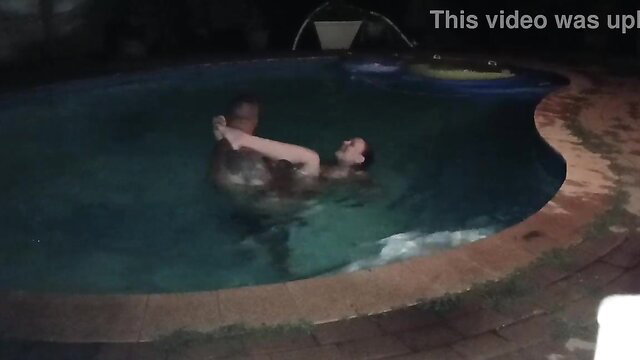 Petite wife fucked in pool threesome, sucking dick poolside