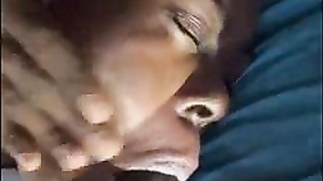 Closeup of black woman sleeping face on blue pillow in amateur adult video