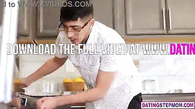 Alexis Malone in kitchen, white shirt, glasses, cooking tease