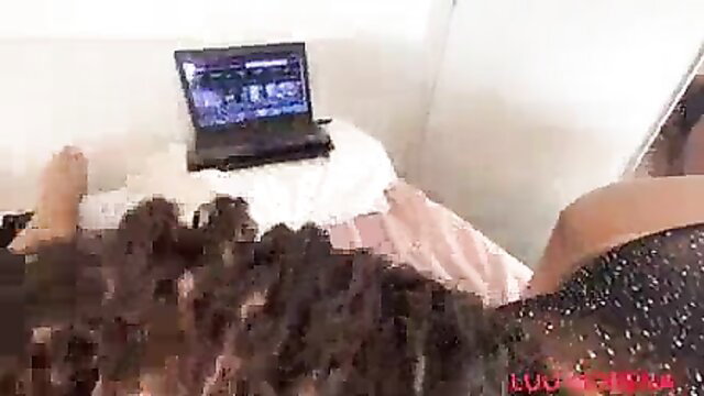 Chubby colleague teases curvy ebony babe on bed, feet up, laptop porn