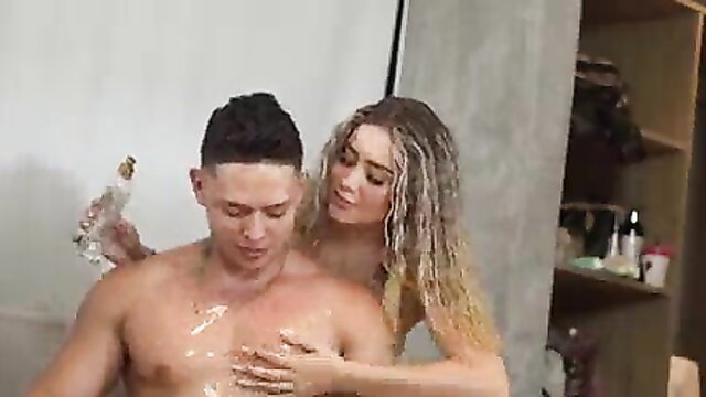 Sara Blonde squirts lotion on friend's muscular chest in hot cuckold tease