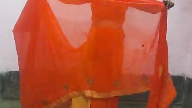 Hot Indian step sister in sheer orange saree dupatta, teasing curves home alone