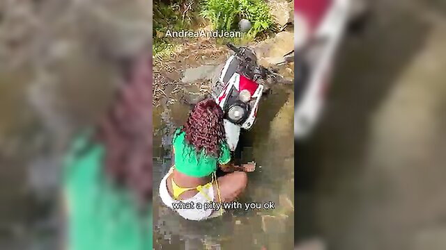 Andrea Ortiz in tiny green bikini by stream on motorcycle, wet curls