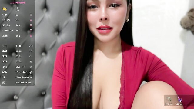 Dream Venus Asian camgirl in deep red cleavage top, long black hair