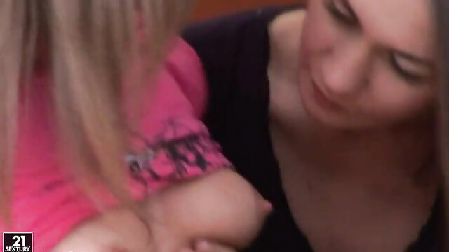 Busty mom breastfeeding baby in intimate closeup