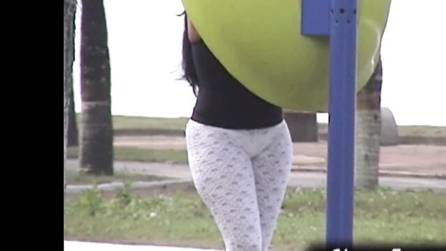 Morena Rabuda bends over showing panties in public beach