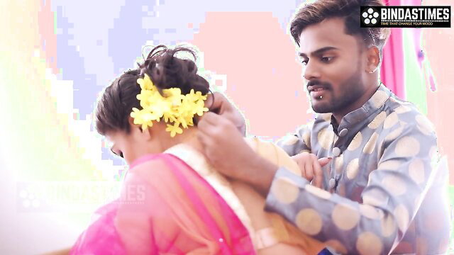 Desi Indian bhabhi gets yellow flower in hair by man on suhagraat night