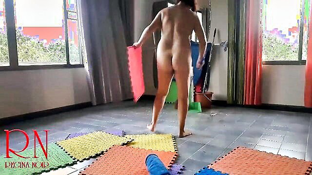 Naked Asian maid bends over cleaning yoga room nude