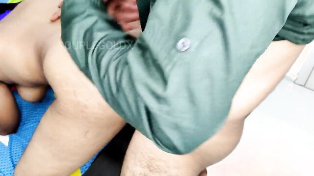 Indian man pulling pubic hair from woman's shaved pussy in closeup