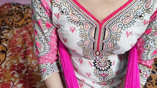 Punjabi bhabhi in pink salwar kameez shows deep cleavage tease