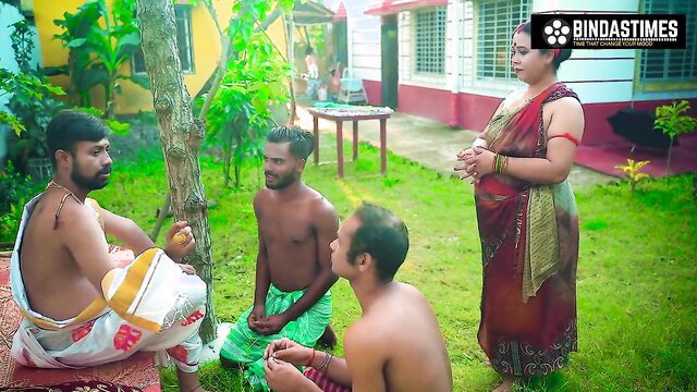 Indian Jamindaar in dhoti with busty kamwali bai and men outdoors
