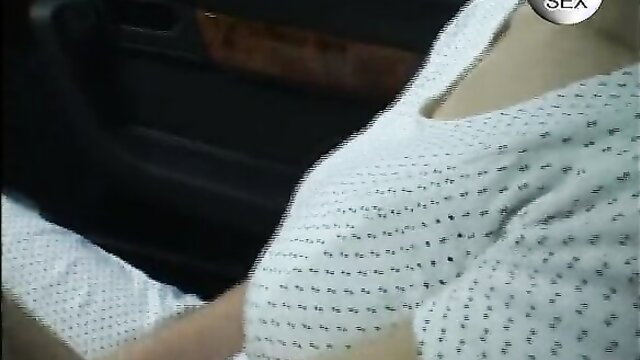 Busty white mature woman in sparkly top, huge cleavage tease in car