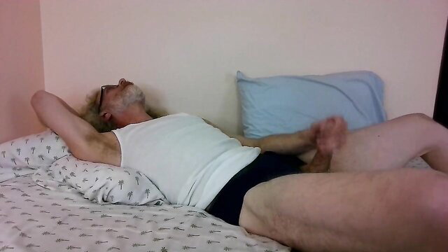 Mature daddy JerkinDad14 masturbates dong in blue briefs on bed