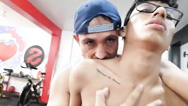 Colombian gay twink choked and groped by trainer in gym